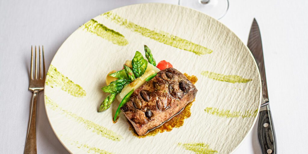 Gegrilde sukade met een papillotte van zomerse groenten