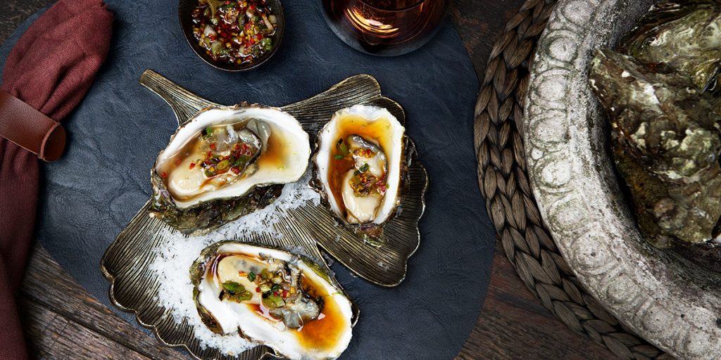 Gegrilde oesters met Thaise dressing